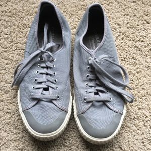 Tretorn lace up with canvas. Rubber non slip sole